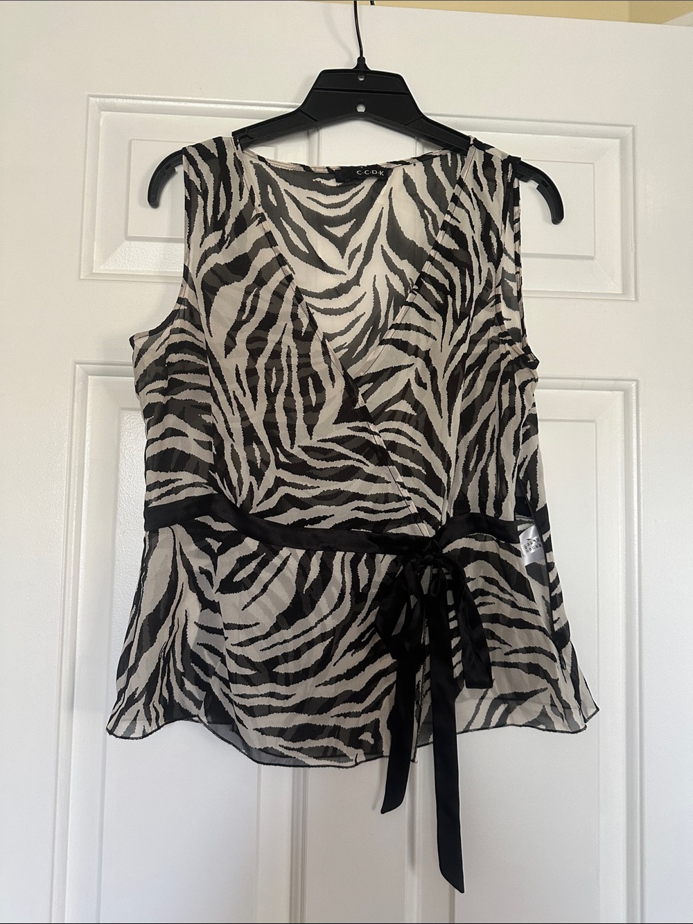 CCDK silk top. Black & White Zebra Print Sleeveless Wrap Top. Very fine.